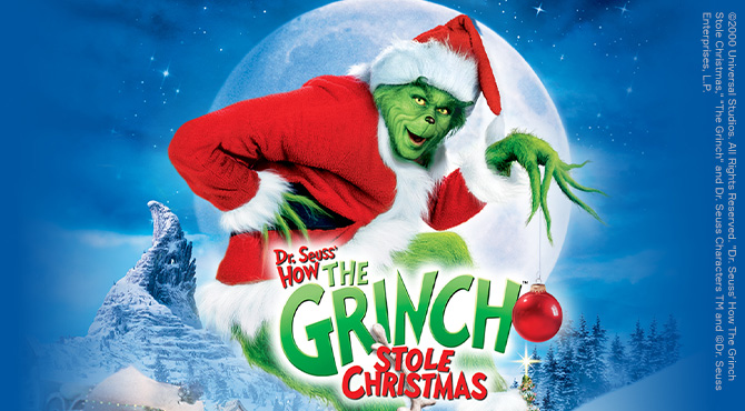 Grinčs Ziemassvētku vecīša drēbēs